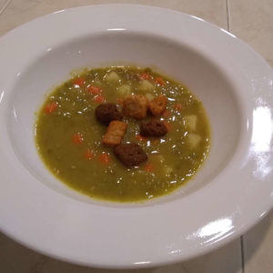 Bowl of Pea Soup With Croutons