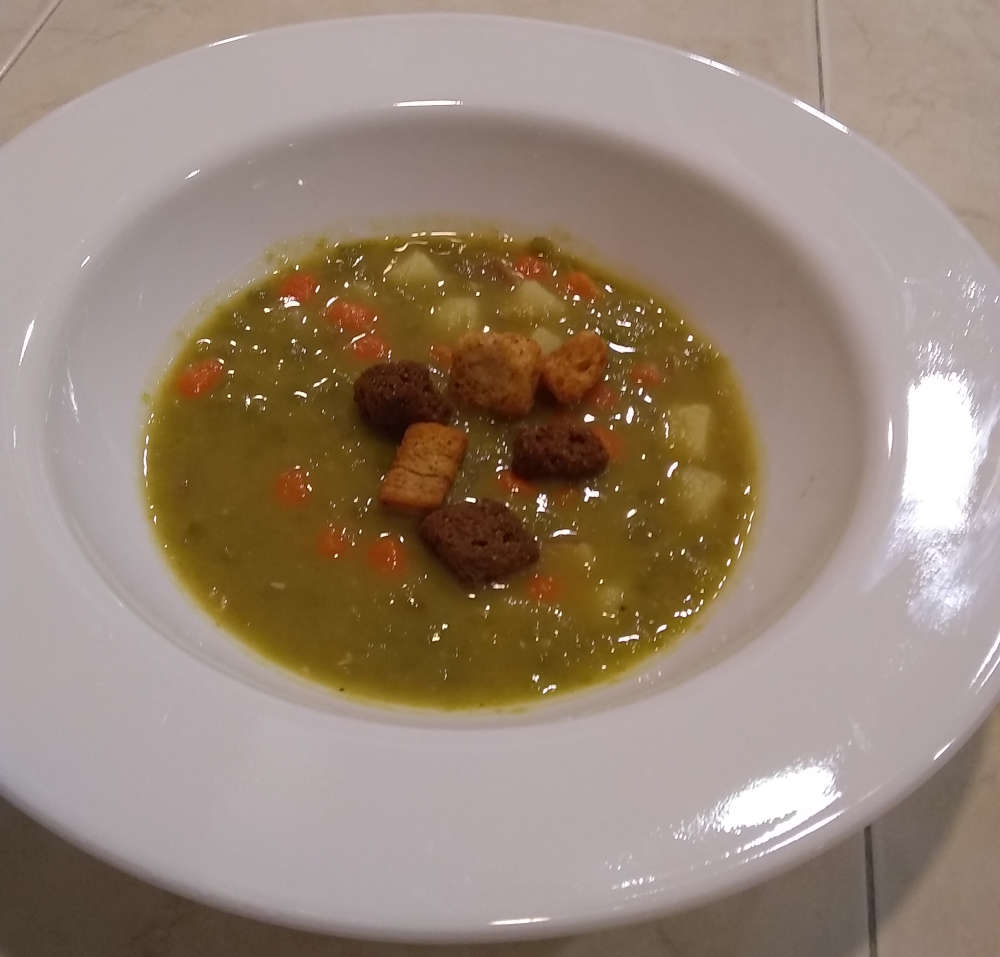 Bowl of Pea Soup With Croutons