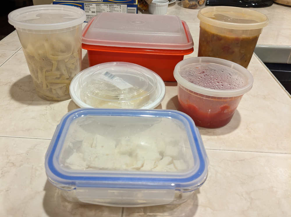 A bunch of leftovers in containers