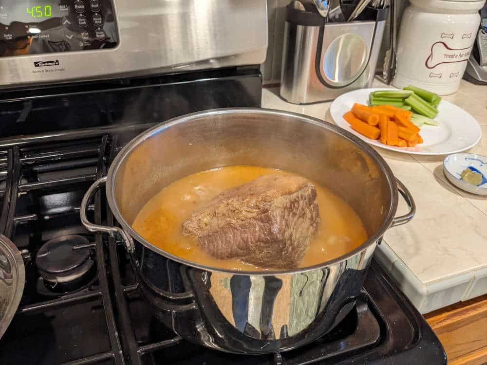 Pot Roast Simmering On Stove Top